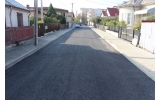 Primul strat de asfalt și pe strada Putnei